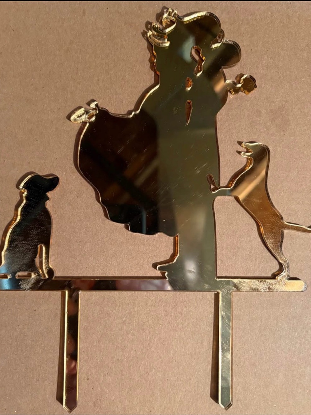 Gold mirrored wedding cake topper with couple and Dogs